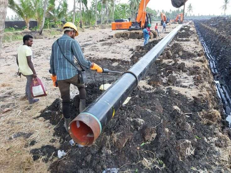 Field crew installing a pipeline